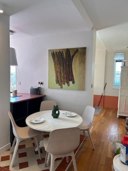 Un Fabuleux Decor Pour Un Chaleureux Appartement Paris Exterior foto
